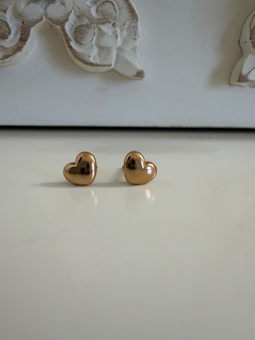 Pandora Rose Gold Puffed Heart post earrings.